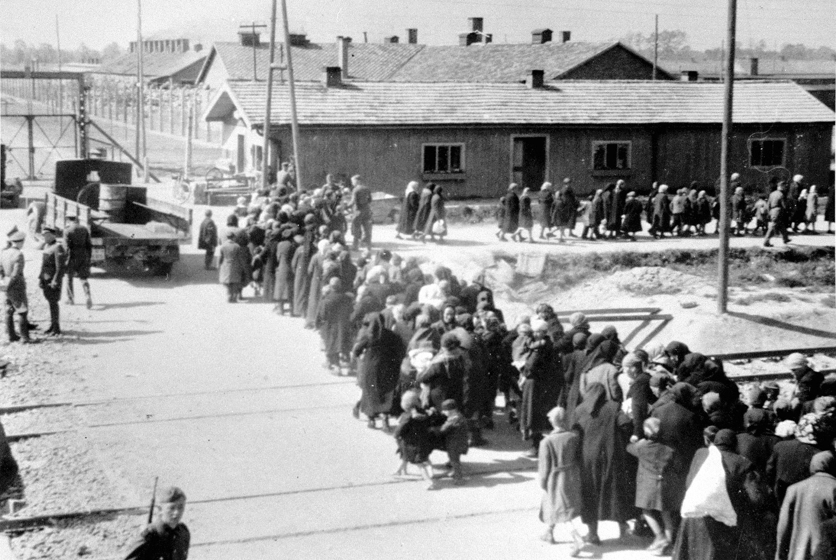 Birkenau_a_group_of_Jews_walking_towards_the_gas_chambers_and_cremator
